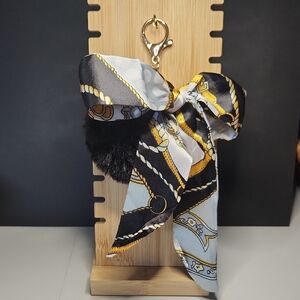 Black and Gold Purse Charm/Keychain With Black Pom Pom And Bow